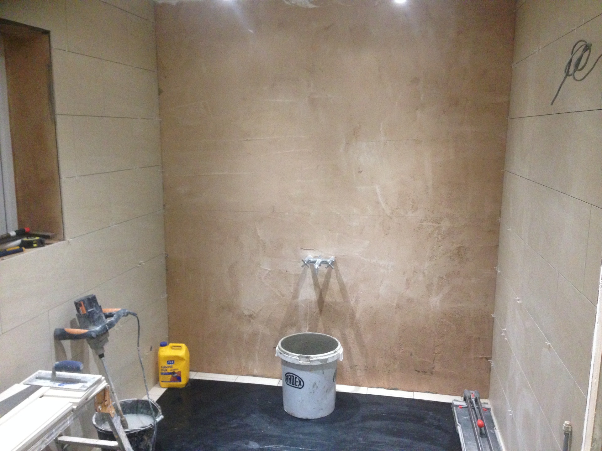 Plastering and tiling