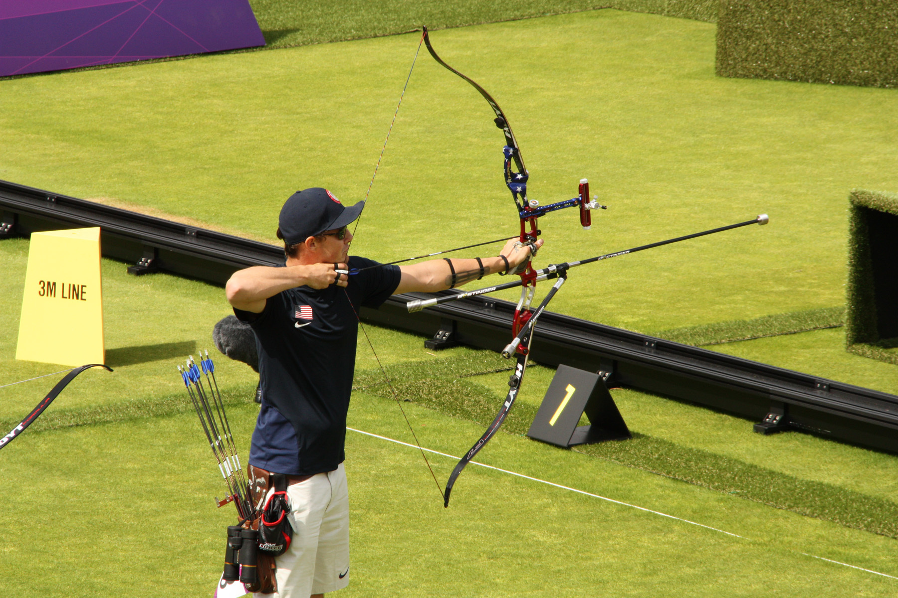 olympic archery bow and arrow