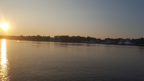 Sun coming up over Manasquan from the inlet