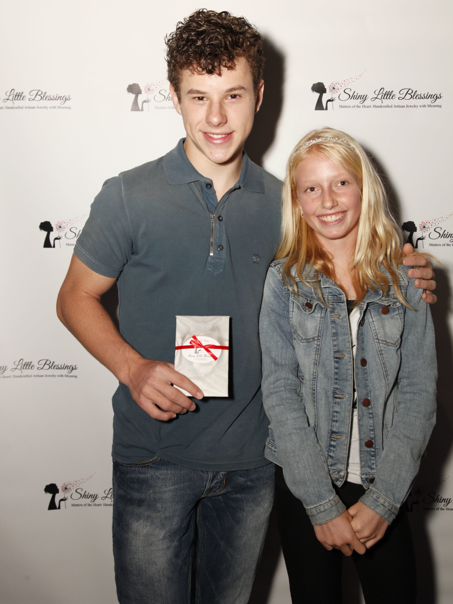 nolan-gould-with-shiny-little-blessings-jewelry-emmys-2015