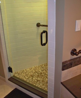 Shower next to the tub