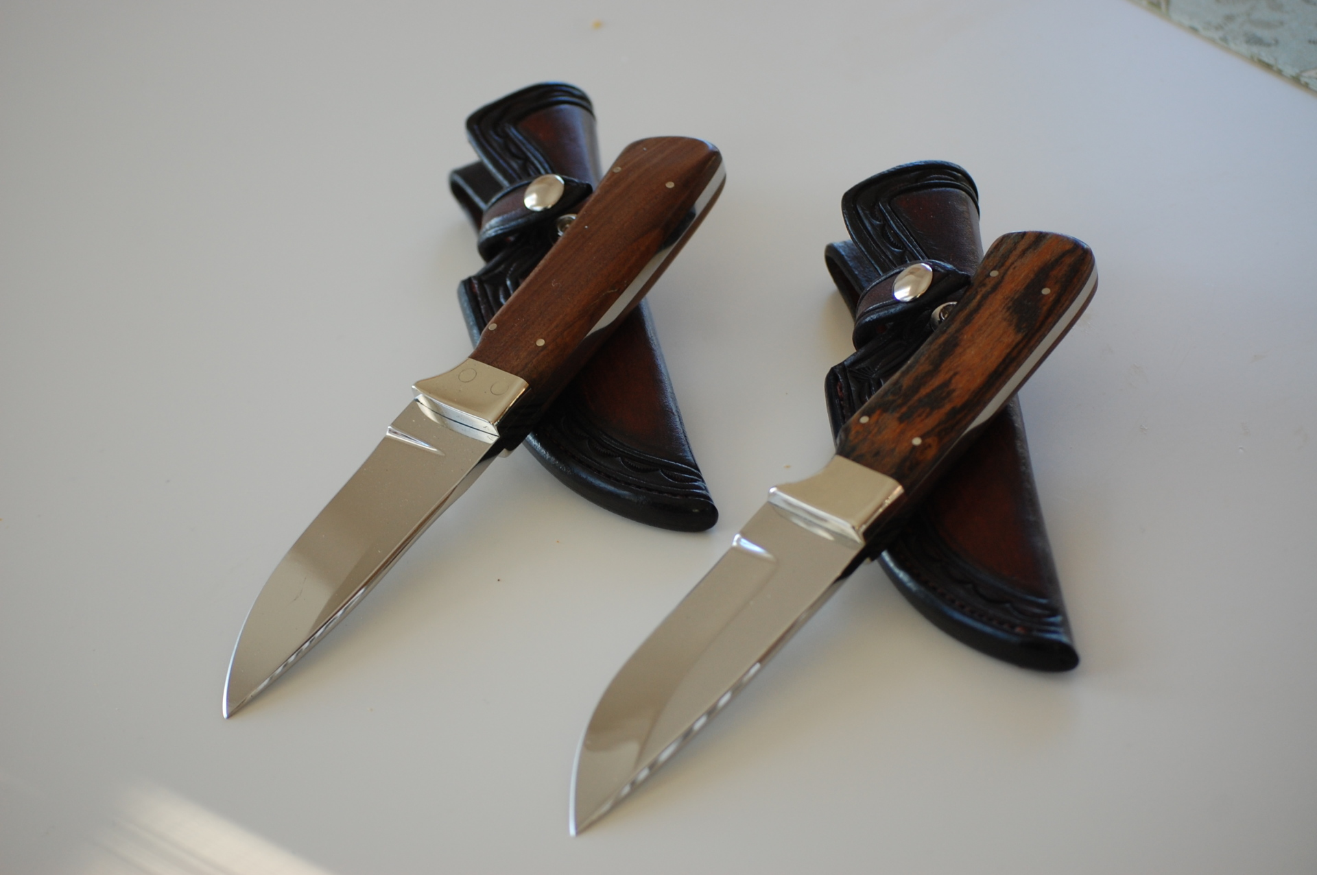 Drop Point Hunting knives with custom handmade leather sheaths