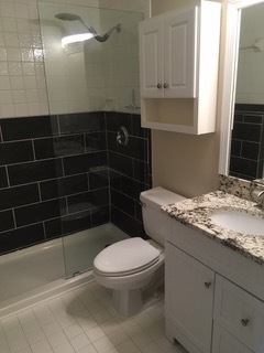 Tub size shower and bath from front bedroom