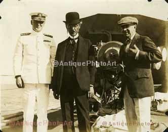 3 men in front of plane