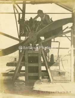 Mechanic working on plane engine