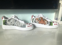 Hand painted with much detail on Nike Air Force 1's These four animals: Lion, Tiger, Elephant, and Rhino, are endangered due to taxidermy, sport, and other selfish reasons.