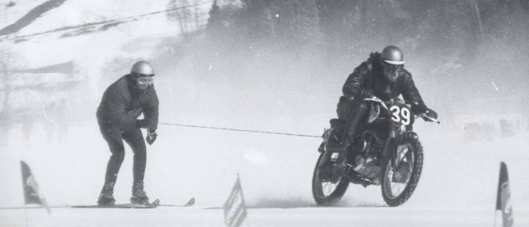 historic picture of skijoring on lake Zell Skijoring with motordycles