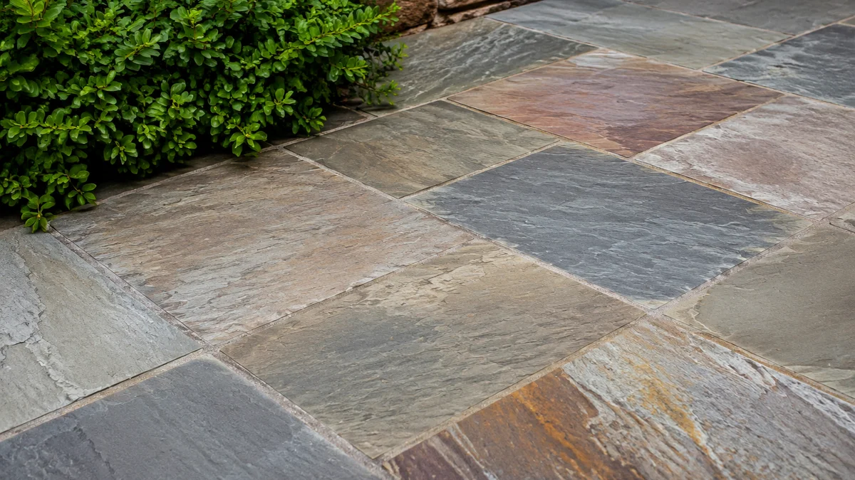 Close-up of a natural stone patio illustrating its texture and durability.