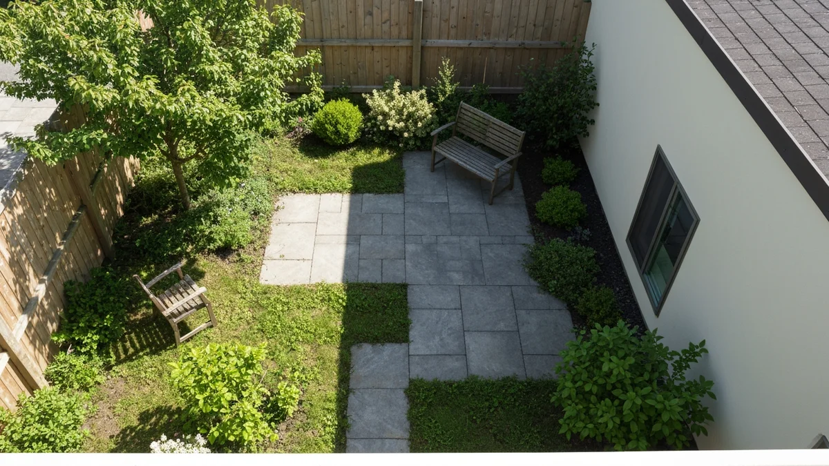 Overhead view of a small backyard layout with sunlight and shade