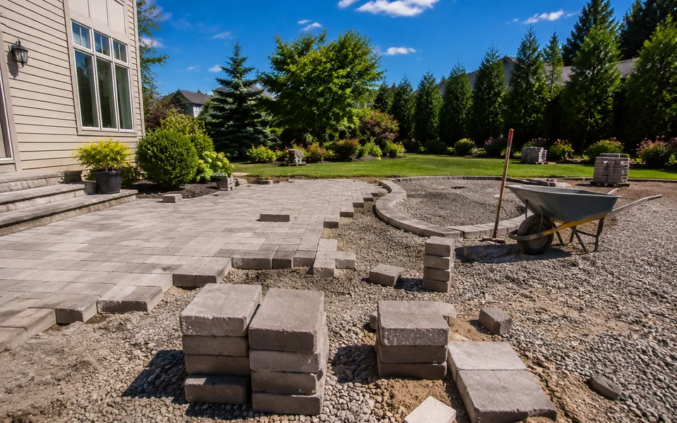 Backyard with paver project layout and materials