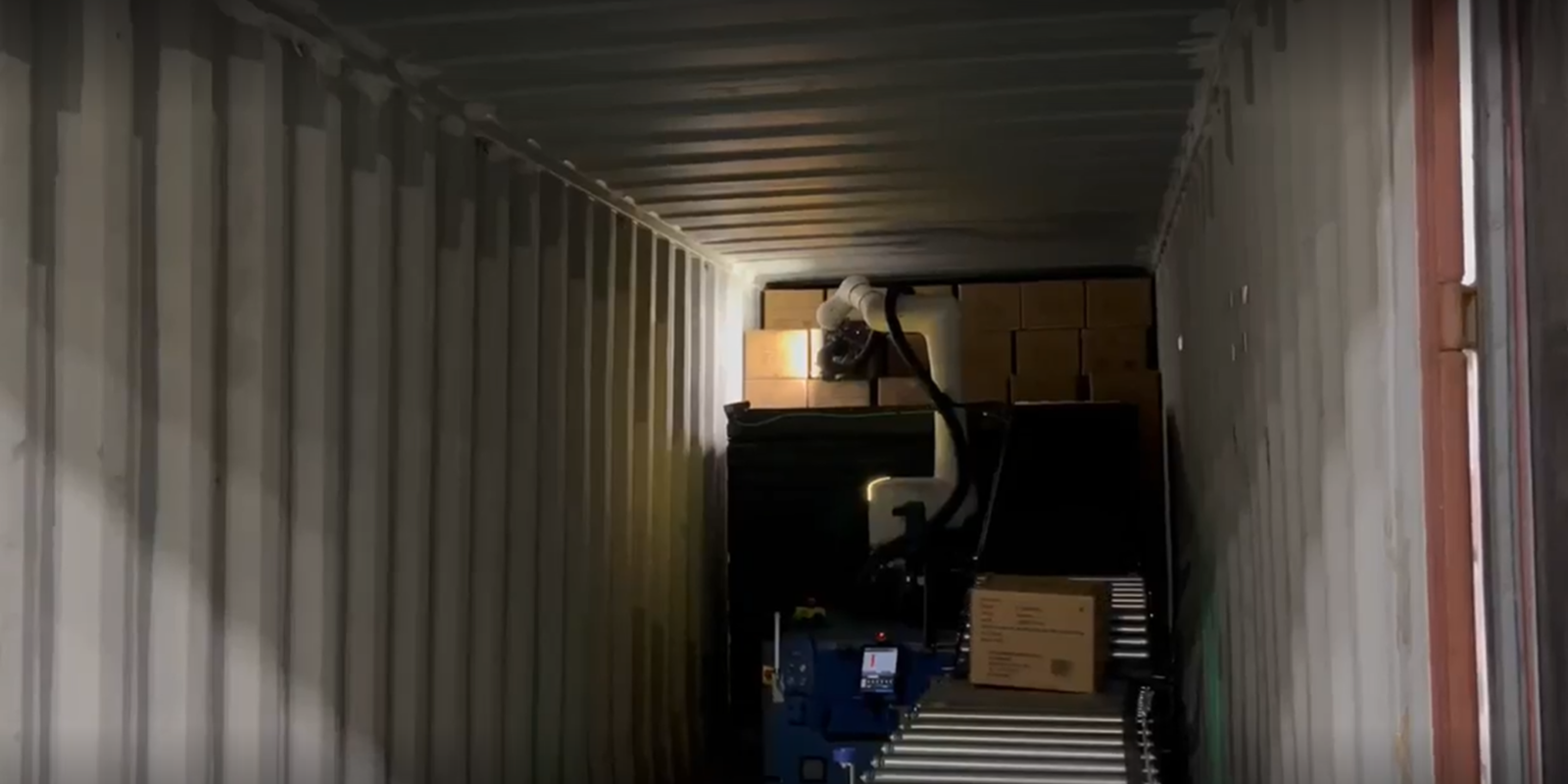 Pixmo robot at work on a warehouse floor