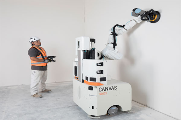 Canvas 1200CX drywall finishing robot on a job site
