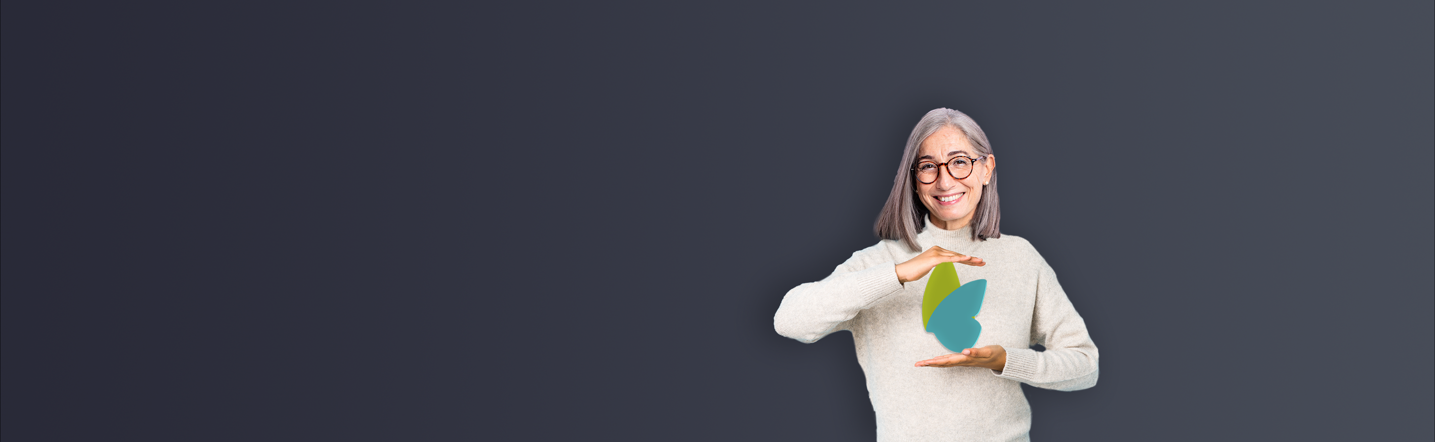 CareHarmony brand image: a patient cradling the company's teal-and-yellow butterfly mark against a navy field