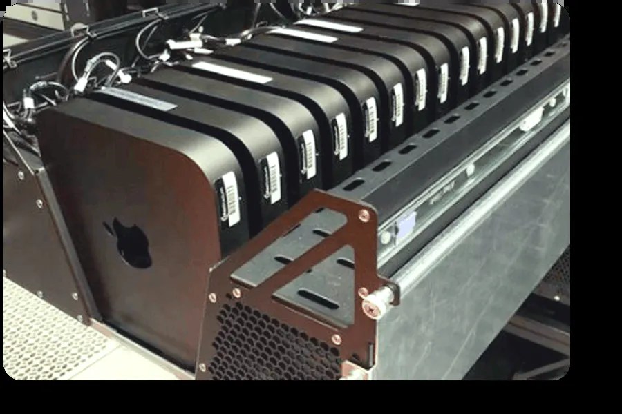 Rows of Mac minis in a custom data center drawer