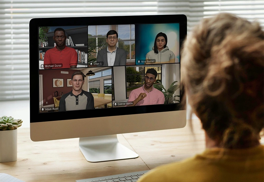 A Mursion learner facing the platform's virtual avatars on screen.