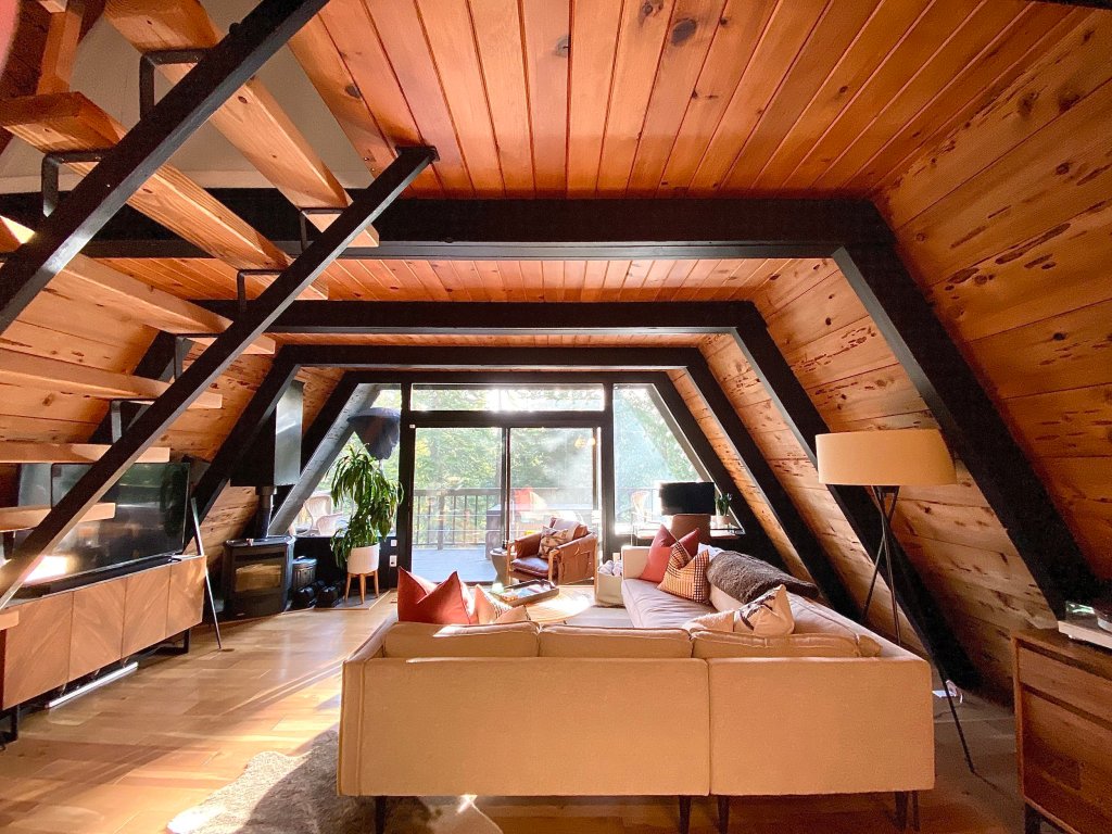 A wood-paneled interior from a Nestment co-bought home near Lake Tahoe