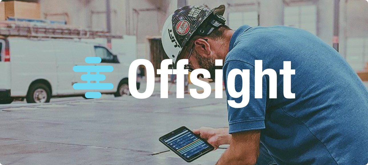 Offsight - a worker on a prefab factory floor uses the Offsight app on a tablet