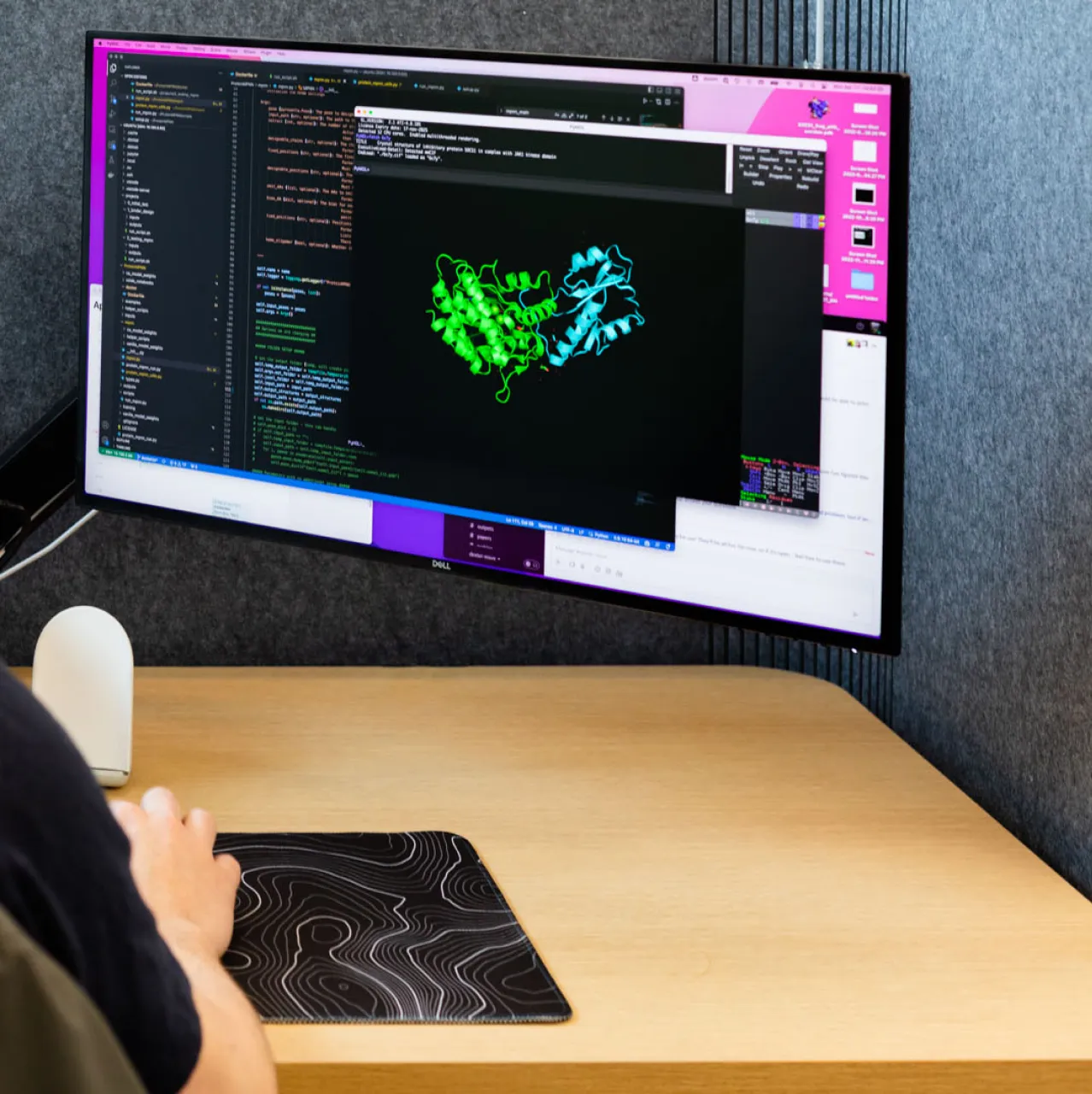 Outpace Bio protein design at work - a de novo protein rendered on screen in the Seattle lab