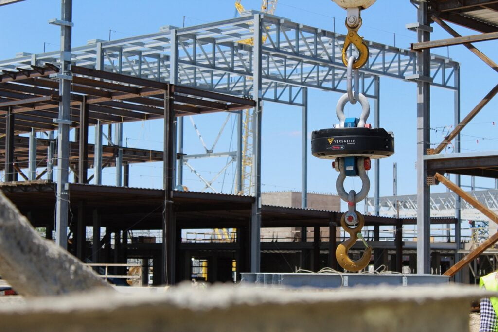 Versatile CraneView mounted under a crane hook on a construction site