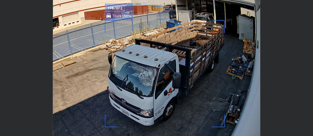 UniFi Protect Alarm Manager overview: AI detecting access in a commercial warehouse.