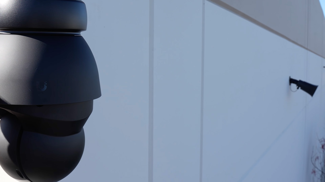 Integration of a PTZ security camera with an AI-powered IP horn speaker for active deterrence