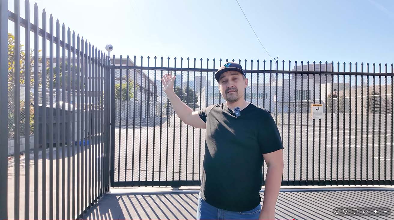 Security technician testing the automated gate camera system