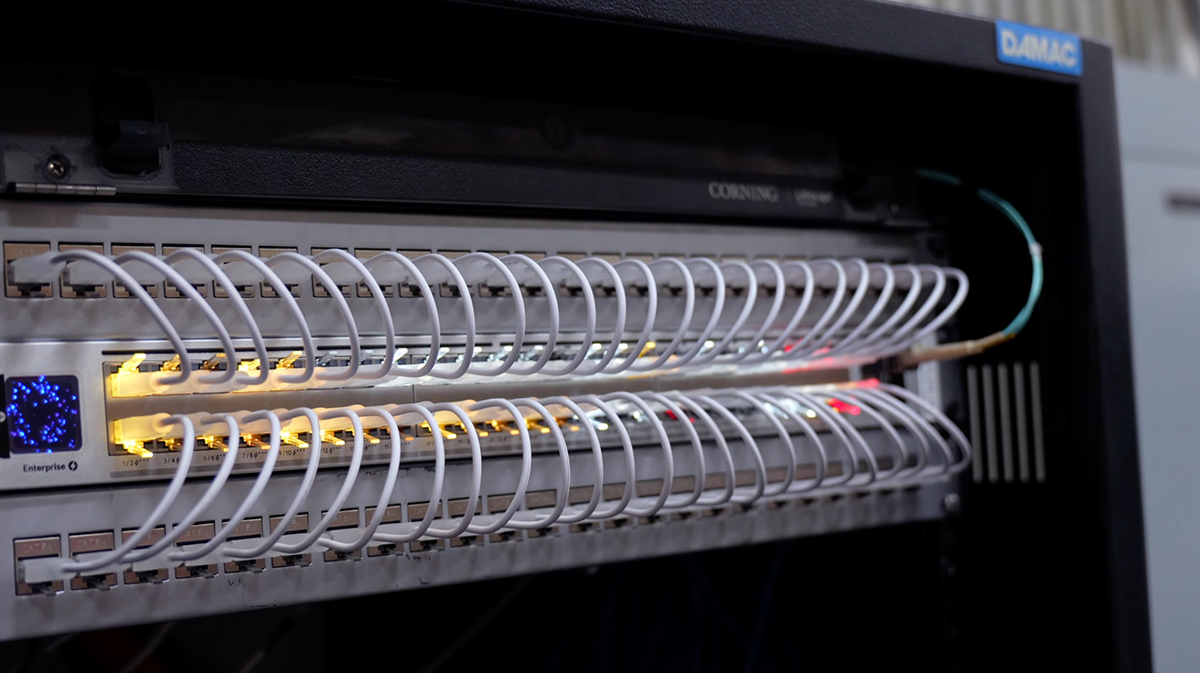 IDF rack showing fiber optic uplinks