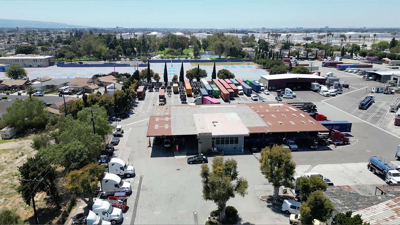 Aerial drone view of Rainbow Transport Tank Cleaners commercial truck yard facility
