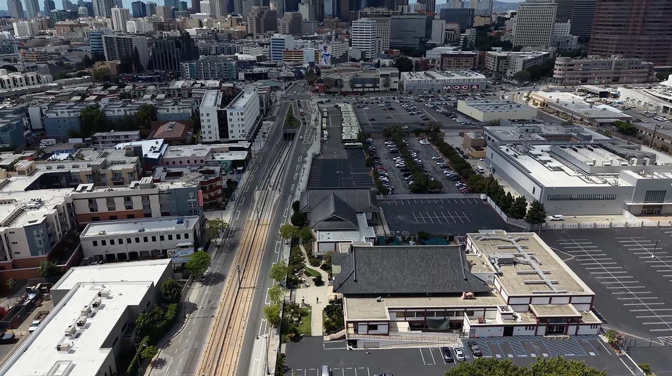 Aerial drone view of the temple complex and security perimeter