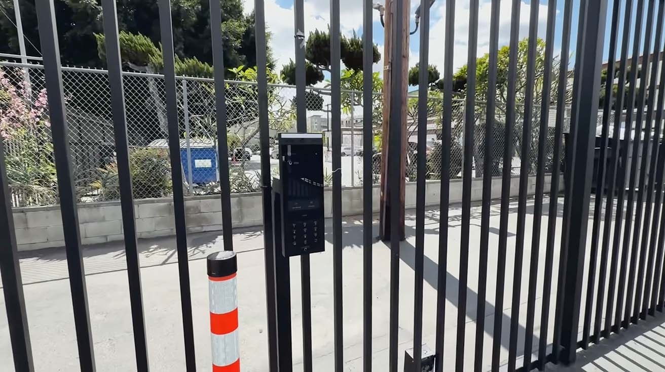 UniFi Access G3 Intercom mounted on an outdoor metal fence column