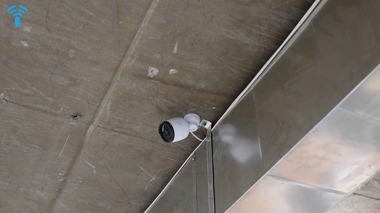 Office ceiling installation of the UniFi Protect G6 Bullet security camera