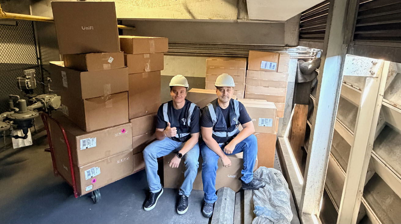 YesTechie lead engineers on-site at a commercial facility, fully equipped to restore critical enterprise network operations.