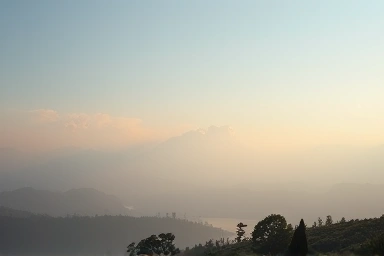 Serene landscape with person breathing, symbolizing peace and control.