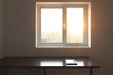 Minimalist interior with dawn light, symbolizing planning and preparation for future goals.