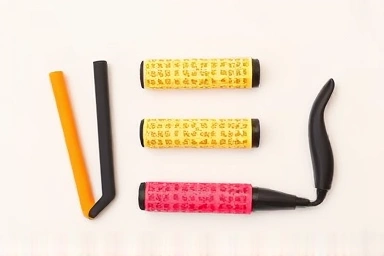Variety of hair rollers for achieving voluminous bangs.