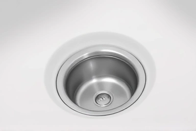 Clean bathroom drain, symbolizing freshness and a clear pipe.