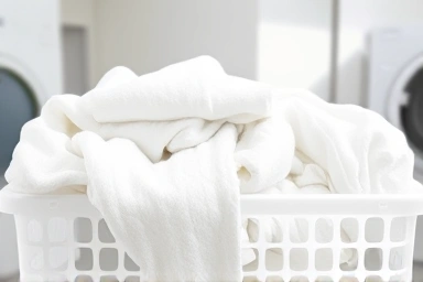 Fluffy laundry with a dryer sheet symbolizing freshness.