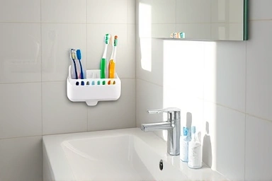 Modern bathroom with elevated toothbrush holder.
