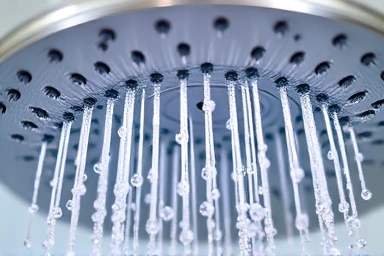 Close-up of advanced showerhead nozzles saving water.