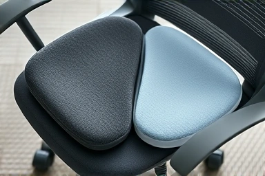 Memory foam and gel seat cushions on an office chair.