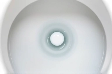 Symbol of cleared toilet clog with a rising bubble