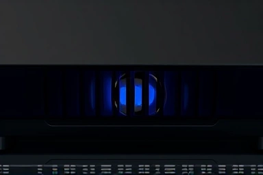 Close-up of laptop cooling fan preventing overheating and improving performance.