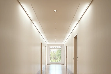 Spacious modern hallway with well-placed lighting