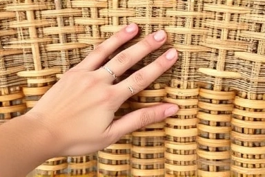 Close-up of durable outdoor rattan weave texture.