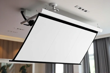 Sleek projector screen unfurling from ceiling mount in a stylish room.
