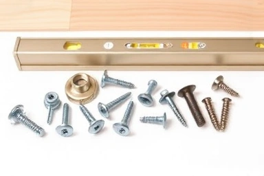 Wall shelf installation hardware and tools.
