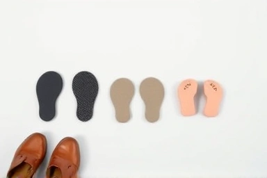 Variety of shoe heel blister protection pads and new shoes.