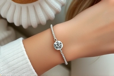 Pandora bracelet on a wrist, showing a perfect fit with charms.