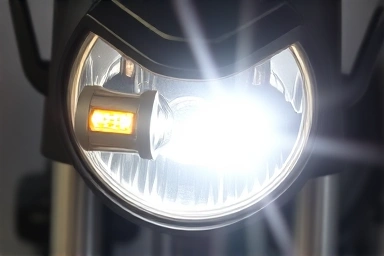 Comparison of dim halogen vs bright LED motorcycle headlight bulbs