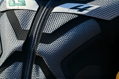 Motorcycle mesh jacket fabric with airflow channels
